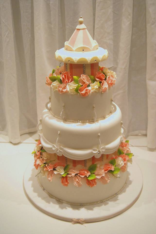 carousel of love wedding cake